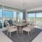 Ocean Condo 104 ~ Ground Floor Corner Condo with wrap around balcony Walk right out to Pool - New Smyrna Beach