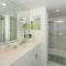 Ocean Condo 104 ~ Ground Floor Corner Condo with wrap around balcony Walk right out to Pool - New Smyrna Beach