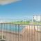 Ocean Condo 104 ~ Ground Floor Corner Condo with wrap around balcony Walk right out to Pool - New Smyrna Beach