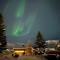 House in the lights and Aurora - Tromsø