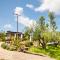 Hakuna Matata Holidays wooden lodge with airco & pool in Greek Olive Grove
