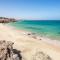 Near the beach with huge terrace, parking and wifi