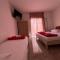 Rooms with shared kitchen "Milica"