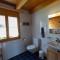 Chalet Regenbogen Leukerbad mit Indoorrutschbahn