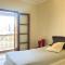 Quarto com varanda tipo Airbn b Vista Panorâmica Aberta Livre