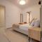 Upscale 2BR Apartment by the Promenade