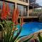 4 Dolphin Views La Mercy Luxury Beachfront Apartment with Private Swimming Pool