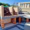 Apartamento en bloque vivienda con piscina y barbacoa a 15 min de la playa