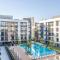 1BR Belgravia Apartment with pool view - Dubaj