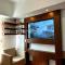 212B Amani Grand Resort Residences near to Airport with pool, gym, wifi, netflix - Pusok