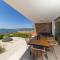 Aqua Blue by Belmont Realty