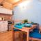 Alpejska Wioska - apartamenty i pokoje z aneksem kuchennym