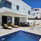 Ria Formosa Beach House, superior modern villa with pool, terrace, beach and sea view