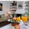 Depa Monserrate - Charming Historic Nest with Breathtaking Mountain Views - Apartaestudio