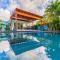 Beachside Bliss Lush Pool, Courtyard & Garden