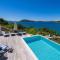 Luxury Seafront Villa Roots with private, heated pool, 5 en-suite bedrooms, enchanting sea views