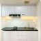Best Modern Studio at Grand Kamala Lagoon Apartment By Travelio