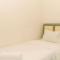 Modern Look 2BR Green Pramuka City Apartment near Mall By Travelio