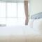 Homey and Comfortable 2BR Tifolia Apartment By Travelio