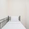 Homey and Comfortable 2BR Tifolia Apartment By Travelio