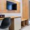 Minimalist Studio Apartment at Casa De Parco By Travelio