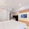 Fancy and Nice Studio Apartment Carstensz Residence By Travelio - Kampung Sawah