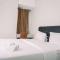 Comfortable and Homey 2BR at Transpark Bintaro Apartment By Travelio