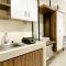 Homey and Cozy Stay Studio Room Pollux Chadstone Apartment By Travelio
