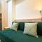 Good Deal 1BR with Working Room at Pollux Chadstone Apartment By Travelio