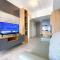 Homey and Spacious Studio Vasanta Innopark Apartment By Travelio