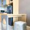 Homey and Spacious Studio Vasanta Innopark Apartment By Travelio