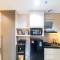 Modern Look and Comfortable Studio at Patraland Amarta Apartment By Travelio