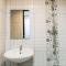 Comfort Studio at De Prima Apartment By Travelio