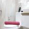 Modern Chic Studio Room at Grand Asia Afrika Apartment By Travelio