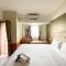 Full Furnished with Simply Look Studio Room Mont Blanc Bekasi Apartment By Travelio