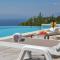 Hotel Natures Retreat, Deluxe Suite mit Balkon und Meerblick