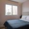 Studio prox shopping Curitiba Wifi, TV a Cabo e ar by UROOMS - كوريتيبا