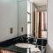 FRATELLI CORP APART HOTEL