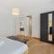 Central Lux 2BR Apt with City Views & Balcony