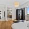 Central Lux 2BR Apt with City Views & Balcony