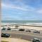 Beachfront Fourth-Floor Condo with Community Pool!