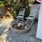 Mediterranean poolside garden cottage