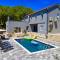 Luxury Villa Andrea Vrzika in forest near the sea