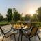 StayVista at The Cityscape with Lawn & Pool