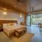 SaffronStays Sonnet - 4BR veg pool villa with grand piano, theater, lawn & mountain views near Mumbai