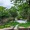SaffronStays Sonnet - 4BR veg pool villa with grand piano, theater, lawn & mountain views near Mumbai