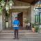 SaffronStays Sonnet - 4BR veg pool villa with grand piano, theater, lawn & mountain views near Mumbai