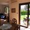 Freistehender Bungalow Perla mit Garten und Grill