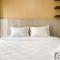 Modern Look and Comfy Studio Tifolia Apartment By Travelio