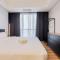 Cozy and Elegant 1BR The Smith Alam Sutera Apartment By Travelio